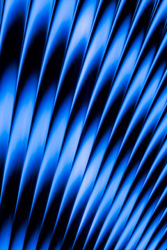 Abstract blue diagonal wave pattern with gradient lighting