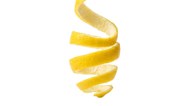 Spiral lemon peel isolated on a pure white background as a food decoration element