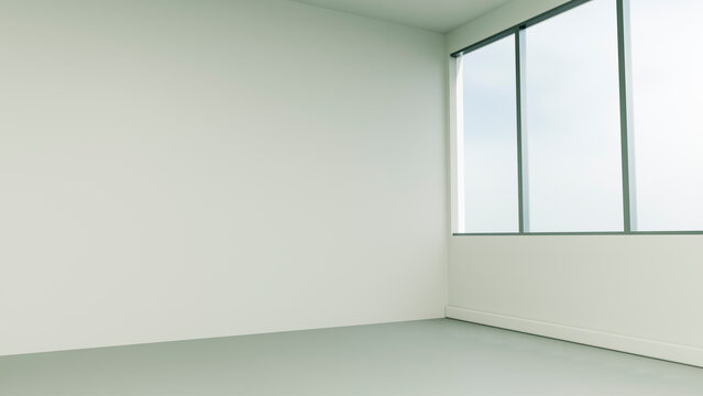 Empty room corner with large windows and natural light
