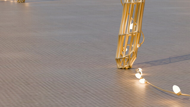 String of glowing bulbs with golden wire cage lampshades on floor