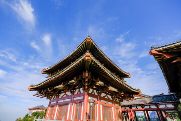 Fototapeta premium Traditional Chinese Temple Pavilion Against Blue Sky