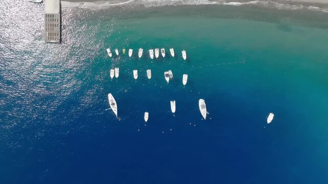Aerial drone view of boats on the sea near Lipari Island, Aeolian Islands, Sicily, Italy