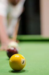 a close shot of pool table and ball © Tarek