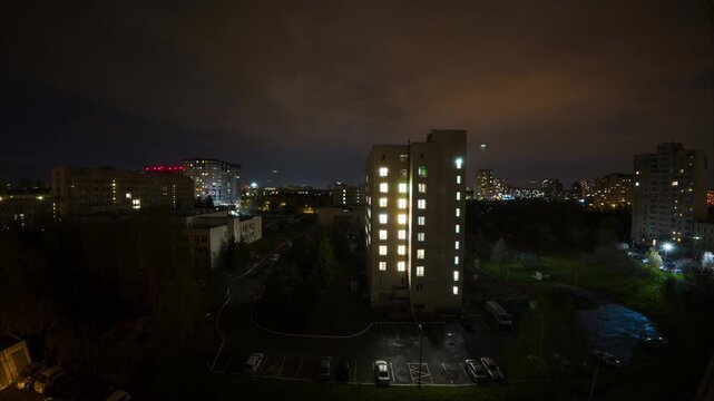 Static Night Timelapse Of Apartment Buildings And City Lights
