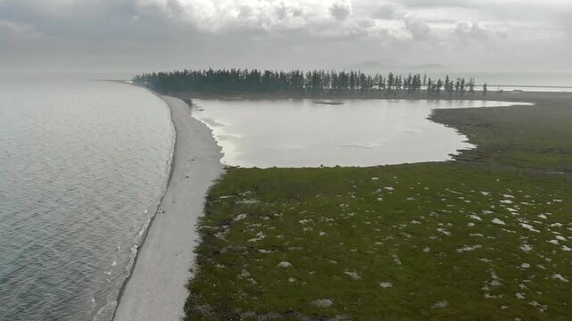 Lake Baikal coastal lagoons show stone barrier formation along a changing freshwater shoreline.