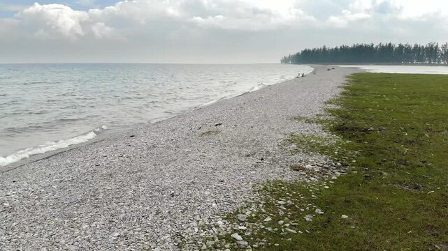 Lake Baikal coastal lagoons show stone barrier formation along a changing freshwater shoreline.