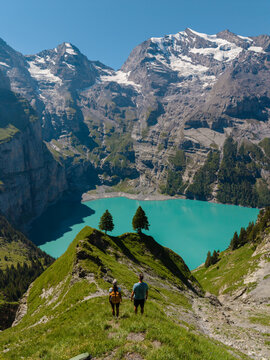 Majestic view of Oeschinensee in Kandersteg, Switzerland attracts hikers and nature lovers