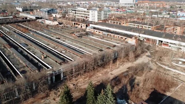 Panoramic view of an old abandoned factory, dilapidated old buildings.