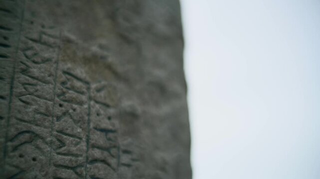 Tonyukuk inscription monument in Mongolia is carved with ancient runic writing on stone.