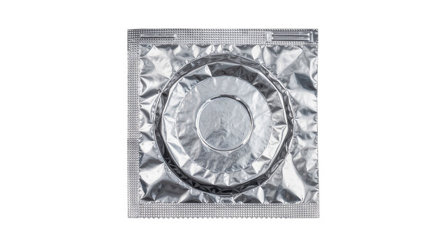 Silver foil condom wrapper with circular embossed pattern, isolated on transparent background