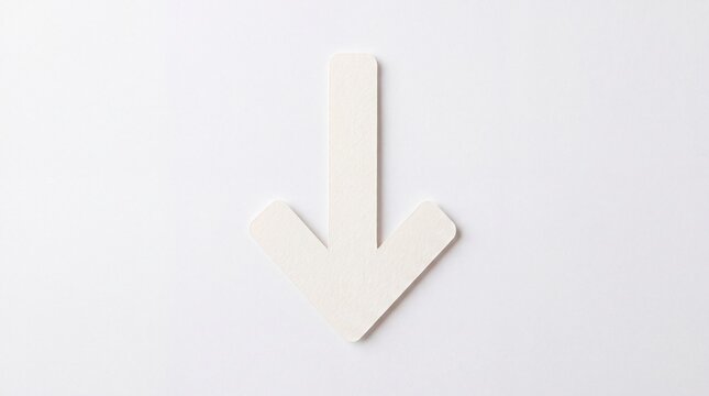 Simple white paper arrow pointing downwards on a clean white background