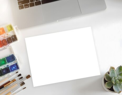 Creative Artist Workspace with Laptop Watercolor Pans Paintbrushes and Potted Succulents, Modern Artistic Desk Scene