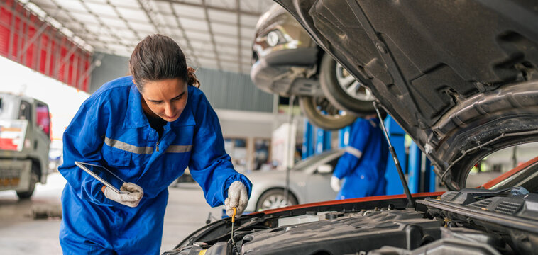 Generated Team Auto mechanic are checking and repair maintenance auto engine is problems at car repair shop.
