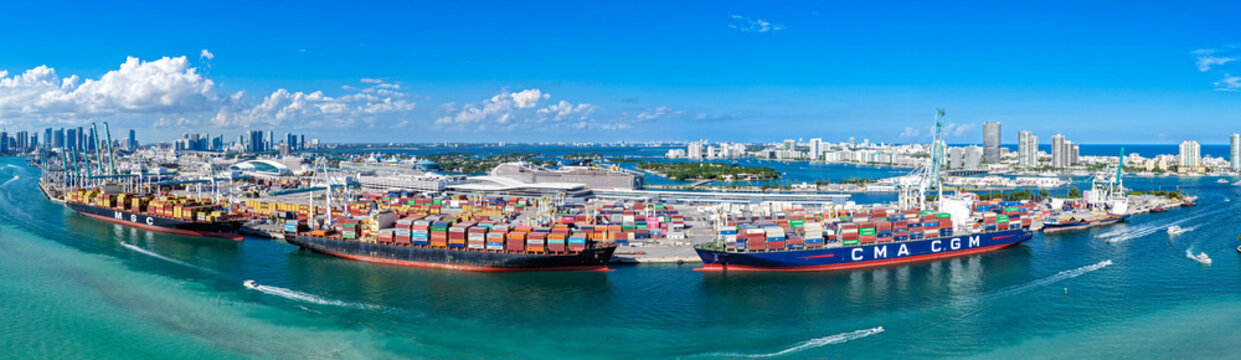 Miami, Florida, USA - November 08, 2025: Miami cargo port panorama. Panoramic port in Florida. Miami port with cargo ship MSC and CMA CGM. Aerial panoramic view. Cargo ship docked in port of Miami
