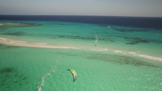 Aerial view of kitesurfer in Los Roques archipelago, Venezuela.