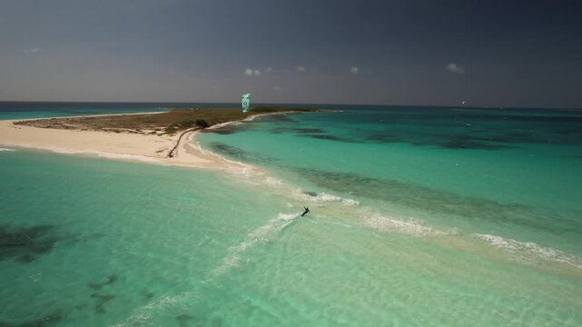 Aerial view of kitesurfer in Los Roques archipelago, Venezuela.