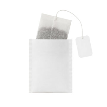 White tea bag with string and paper tag isolated on transparent background PNG element