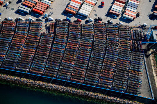 Shipping container trailers and semi trucks parked