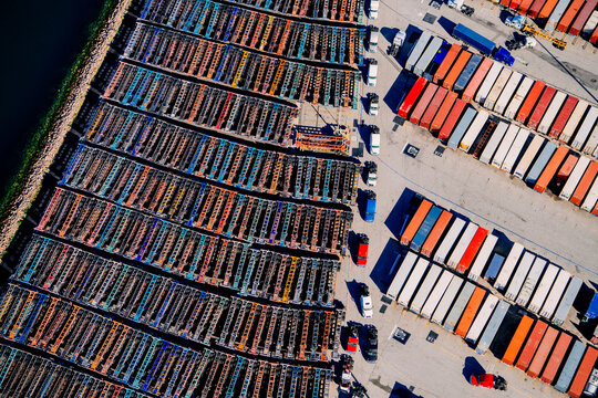 Shipping container trucks and stacked containers