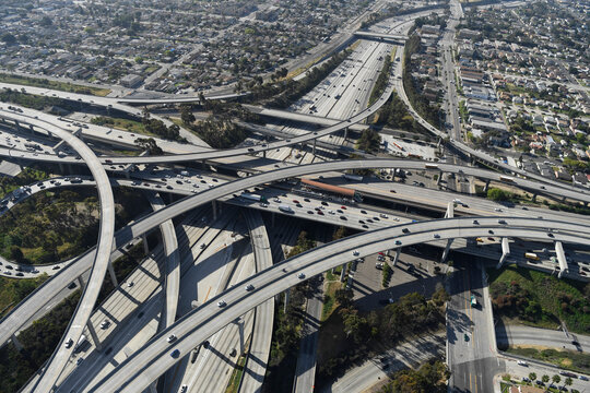 Highway interchange with freeway overpasses and traffic in a beach