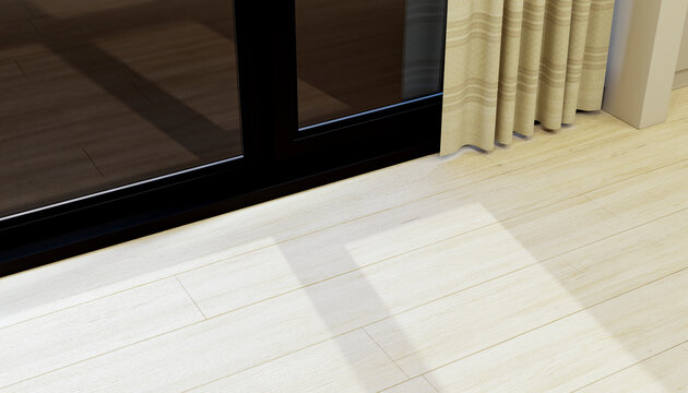 Curtains casting shadow on light wooden floor next to glass door