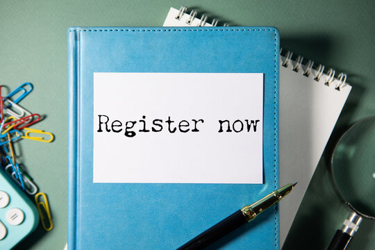 Register now text on paper