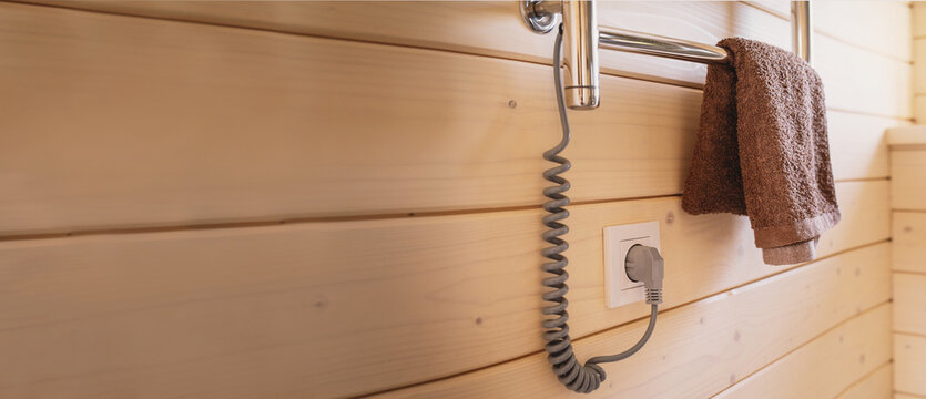 Electric heated towel rail provides efficient bathroom heating, towel drying, moisture control and home comfort while supporting modern energy-efficient household living. banner copy space