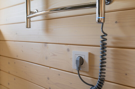 Modern heated towel rail combines electric heating, towel drying, bathroom hygiene and energy-efficient home comfort