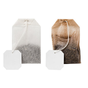 Two tea bags with one white and one brown filter isolated on transparent background PNG element