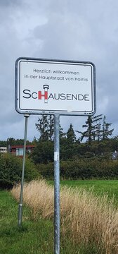 Schausende, Ortsschild