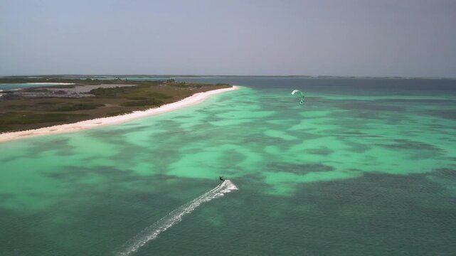 Aerial view of a kitesurfer in Los Roques archipelago, Venezuela.