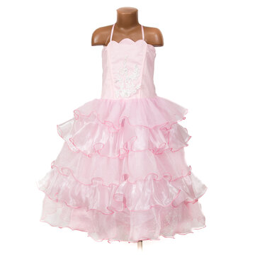 Delicate pink children's party dress with floral embroidery, sparkling fabric and multiple sheer ruffled layers displayed on a mannequin against a white studio background.