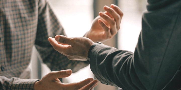 Formal communication versus two people talking while using gestures during a consultation