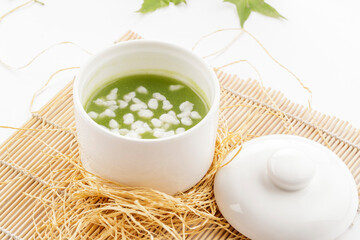 Pearl and Jade Nourishing Soup Served in a White Porcelain Bowl © 徐 建亮