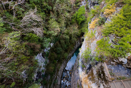 serene aerial view of a canyon with rocks and trees surrounded by water in a natural setting, nature photography and outdoor adventure content................. n.