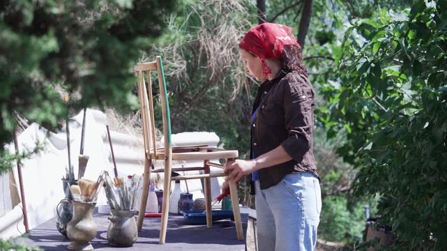 Woman Restoring Old Chair for Sustainable Living
