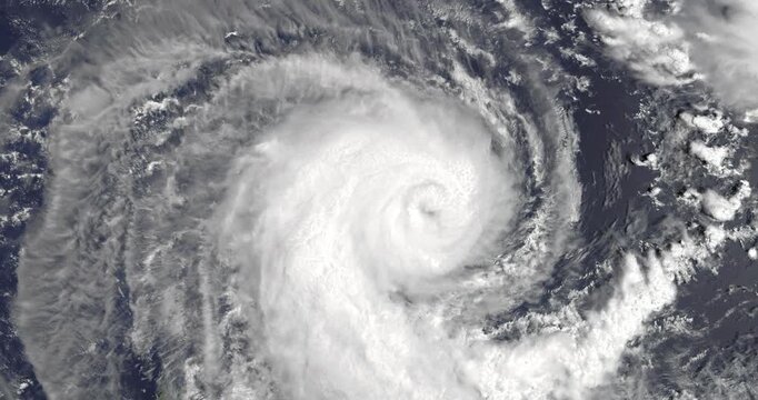 Top shot on cyclone above ocean. Weather change, bad weather concept. Camera is moving right and down. Animation based on image by NASA