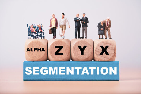 Generational segmentation concept showing Alpha, Gen Z, Gen Y and Gen X groups on wooden blocks representing demographic analysis, age diversity, consumer markets and audience targeting strategy.