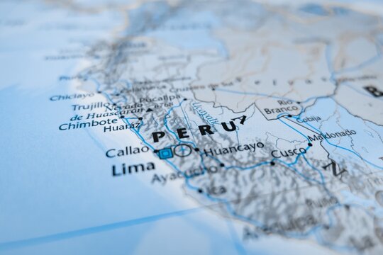 Map of Peru styled in grey color. Selective focus on label, close-up view