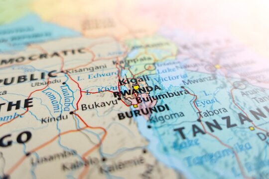 Map of Rwanda with flare from top right corner. Selective focus on label, close-up view