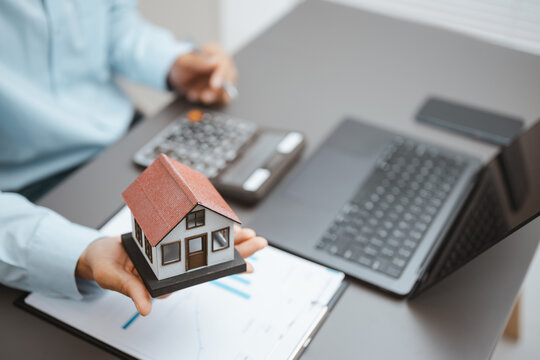 Model dwelling signals realestate property mortgage real estate loan choices, then signals realestate property mortgage real estate loan choices in a warm soft calm bright sunlit natural gentle room.