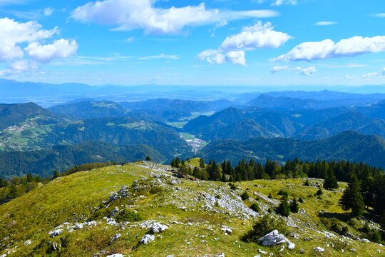 Pastures at Ratitovec and a view of hills and valleys in Gorenjska, Slovenia
