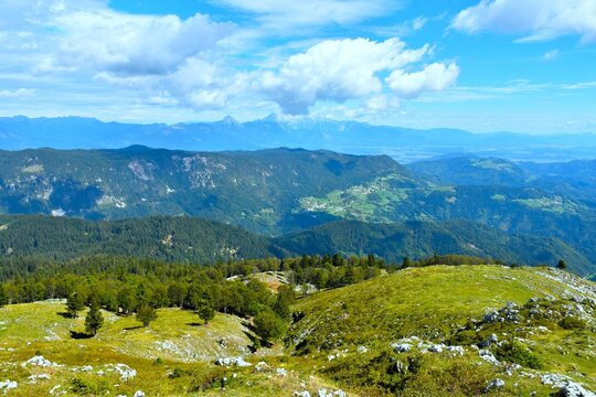 Panoramic view of Gorenjska, Slovenia with the slopes of Jelovica and pastures bellow Ratitovec