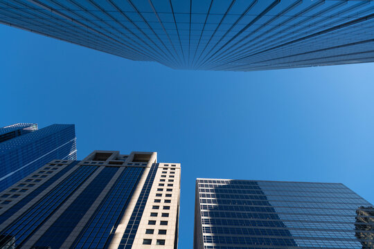 Commercial architecture. City downtown with skyscraper. Office building in business district. Architectural exterior detail. Business skyscraper building. Architectural building business area