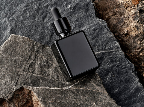unbranded square black glass bottle with pipette dropper