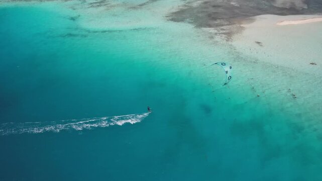 Aerial view of kitesurfer in Los Roques archipelago, Venezuela.