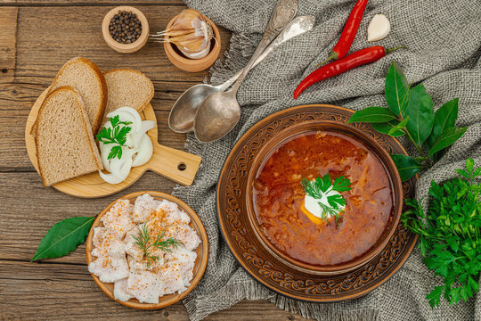 Traditional Ukrainian borscht. Hot dish, national red soup, served in classic style.