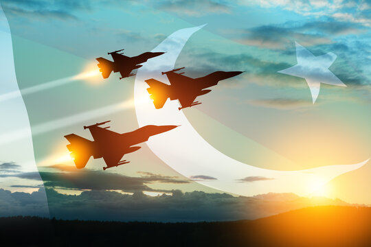 Air Force Day. Aircraft silhouettes on background of sunset with a transparent Pakistan flag. Celebrated in Pakistan as a national day on 7 September. Close-up view.