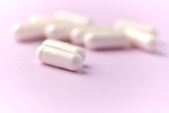 Citicoline capsules. Citicoline is a supplement that boost brain performance and improve memory. Bright background. Soft focus. Close up. Copy space