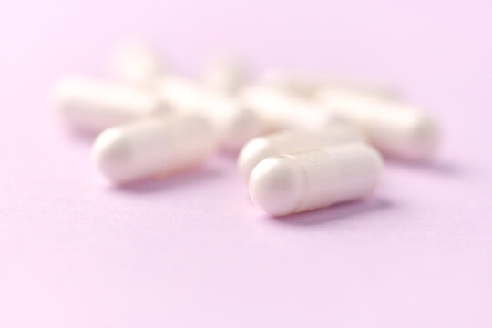 Citicoline capsules. Citicoline is a supplement that boost brain performance and improve memory. Bright background. Soft focus. Close up. Copy space